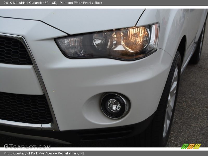 Diamond White Pearl / Black 2010 Mitsubishi Outlander SE 4WD