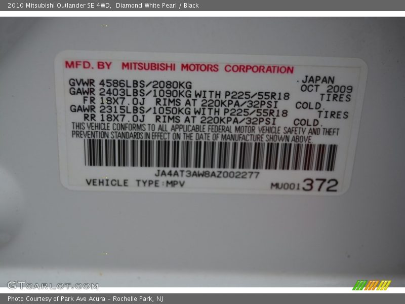 Diamond White Pearl / Black 2010 Mitsubishi Outlander SE 4WD