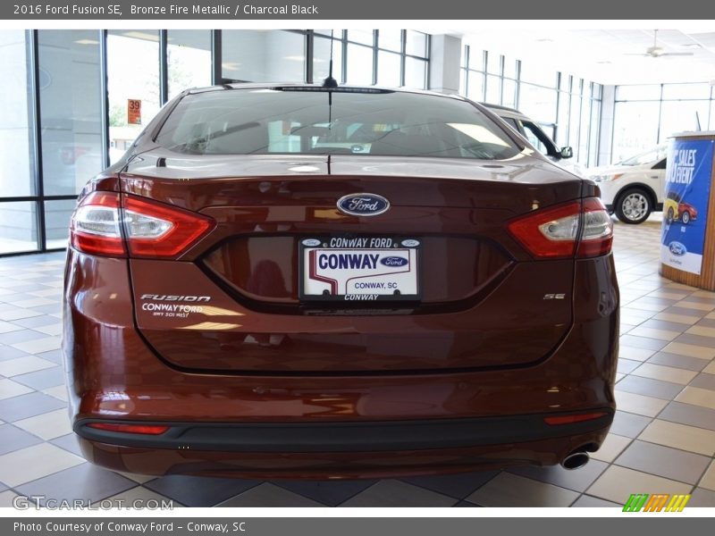 Bronze Fire Metallic / Charcoal Black 2016 Ford Fusion SE