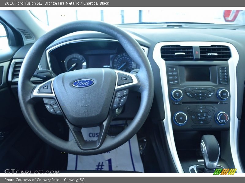 Bronze Fire Metallic / Charcoal Black 2016 Ford Fusion SE