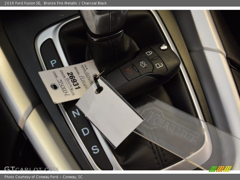 Bronze Fire Metallic / Charcoal Black 2016 Ford Fusion SE
