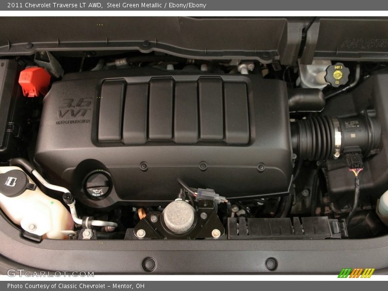 Steel Green Metallic / Ebony/Ebony 2011 Chevrolet Traverse LT AWD