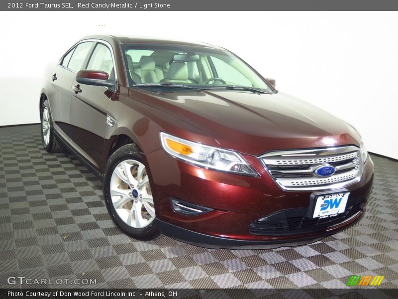 Red Candy Metallic / Light Stone 2012 Ford Taurus SEL