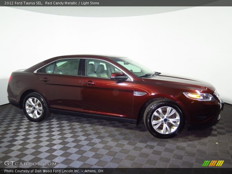 Red Candy Metallic / Light Stone 2012 Ford Taurus SEL