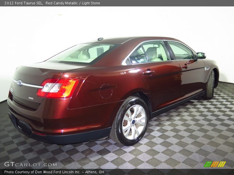Red Candy Metallic / Light Stone 2012 Ford Taurus SEL