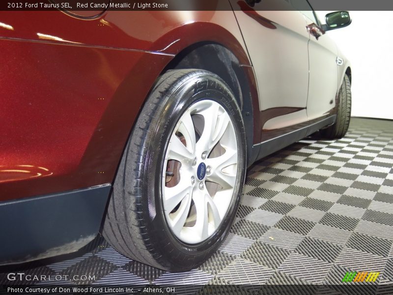 Red Candy Metallic / Light Stone 2012 Ford Taurus SEL