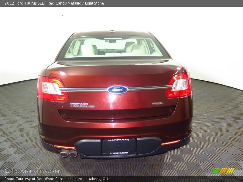 Red Candy Metallic / Light Stone 2012 Ford Taurus SEL