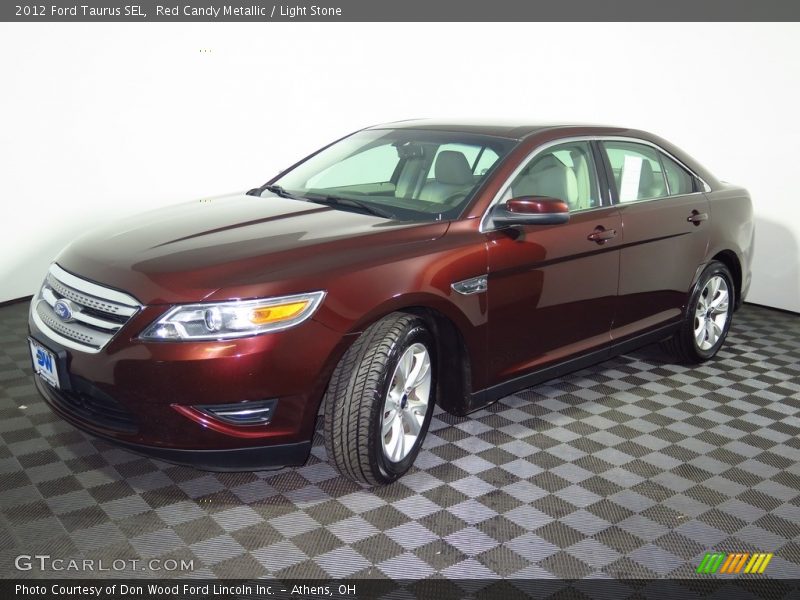 Red Candy Metallic / Light Stone 2012 Ford Taurus SEL