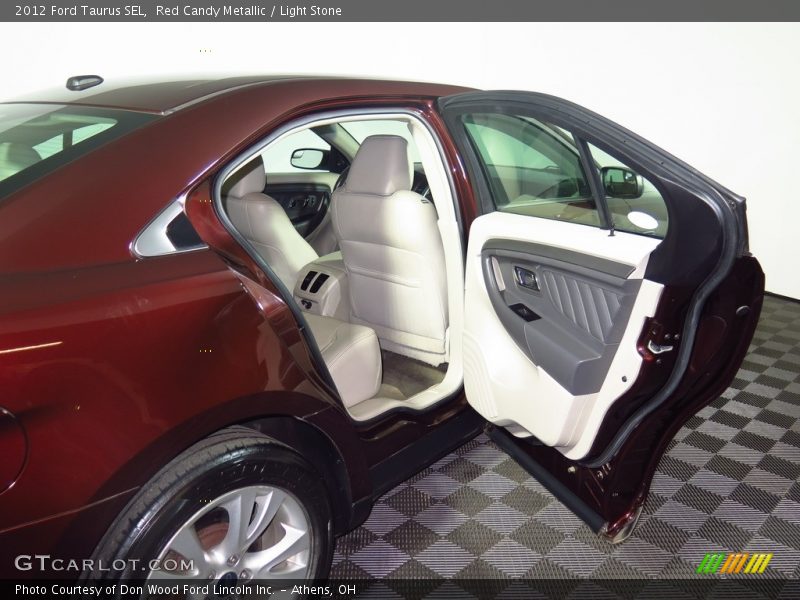 Red Candy Metallic / Light Stone 2012 Ford Taurus SEL