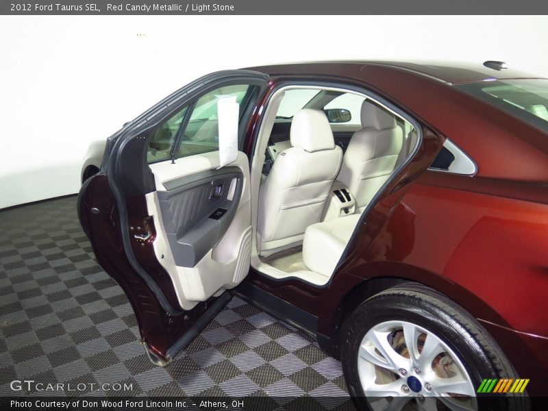 Red Candy Metallic / Light Stone 2012 Ford Taurus SEL