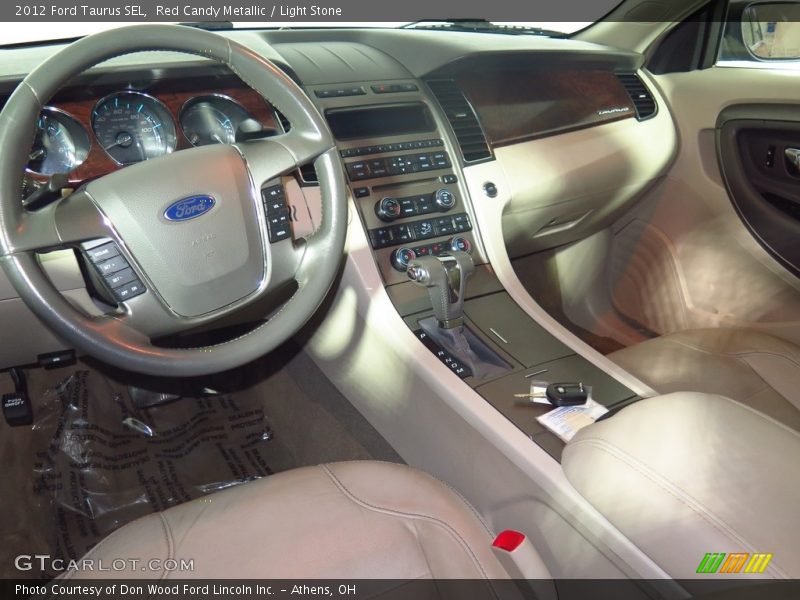 Red Candy Metallic / Light Stone 2012 Ford Taurus SEL