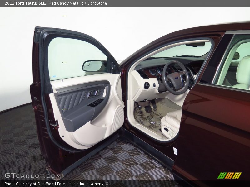 Red Candy Metallic / Light Stone 2012 Ford Taurus SEL