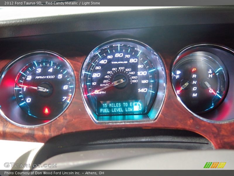 Red Candy Metallic / Light Stone 2012 Ford Taurus SEL