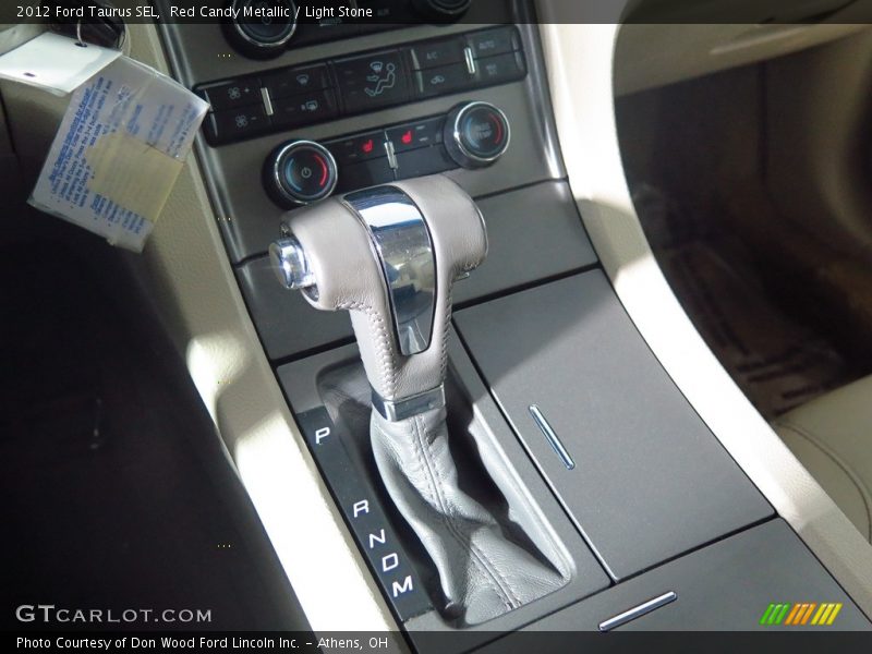 Red Candy Metallic / Light Stone 2012 Ford Taurus SEL