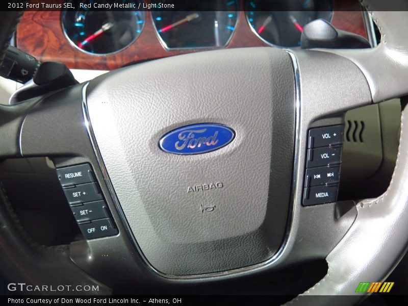 Red Candy Metallic / Light Stone 2012 Ford Taurus SEL