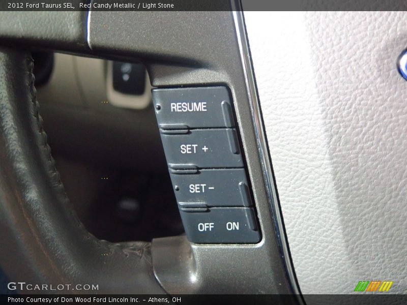 Red Candy Metallic / Light Stone 2012 Ford Taurus SEL