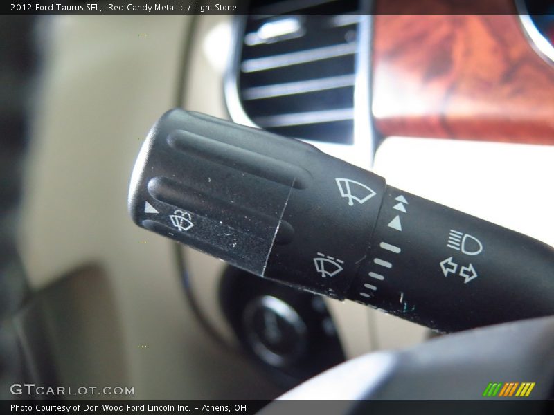Red Candy Metallic / Light Stone 2012 Ford Taurus SEL