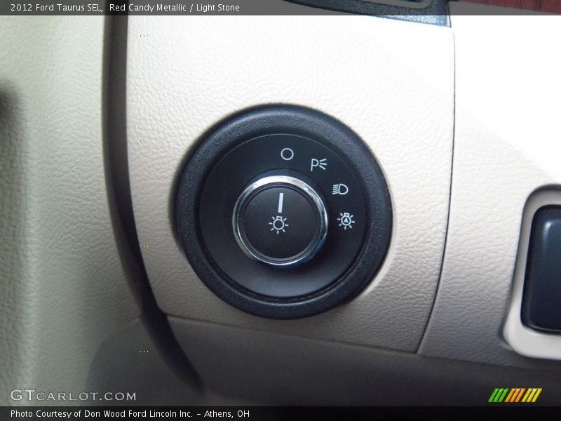 Red Candy Metallic / Light Stone 2012 Ford Taurus SEL
