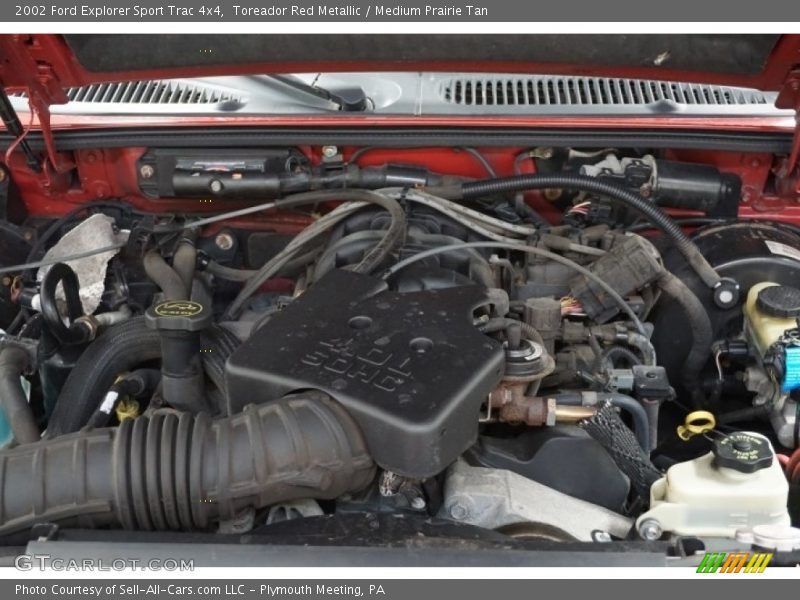 Toreador Red Metallic / Medium Prairie Tan 2002 Ford Explorer Sport Trac 4x4