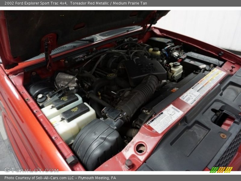 Toreador Red Metallic / Medium Prairie Tan 2002 Ford Explorer Sport Trac 4x4