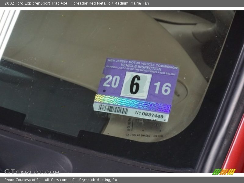 Toreador Red Metallic / Medium Prairie Tan 2002 Ford Explorer Sport Trac 4x4