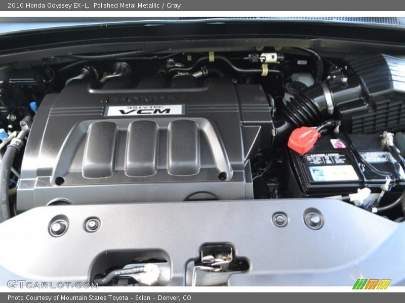 Polished Metal Metallic / Gray 2010 Honda Odyssey EX-L