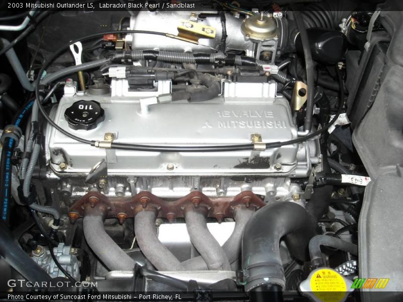 Labrador Black Pearl / Sandblast 2003 Mitsubishi Outlander LS