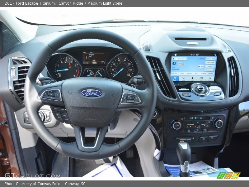 Canyon Ridge / Medium Light Stone 2017 Ford Escape Titanium