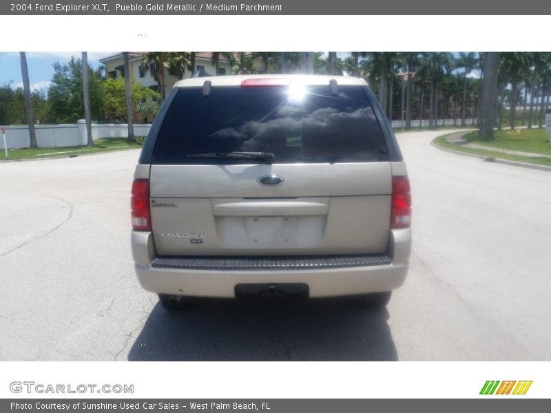 Pueblo Gold Metallic / Medium Parchment 2004 Ford Explorer XLT