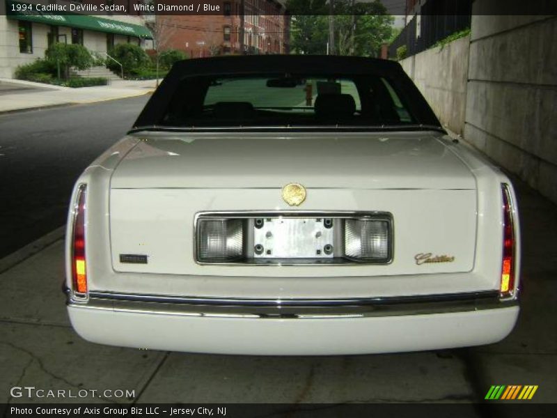 White Diamond / Blue 1994 Cadillac DeVille Sedan