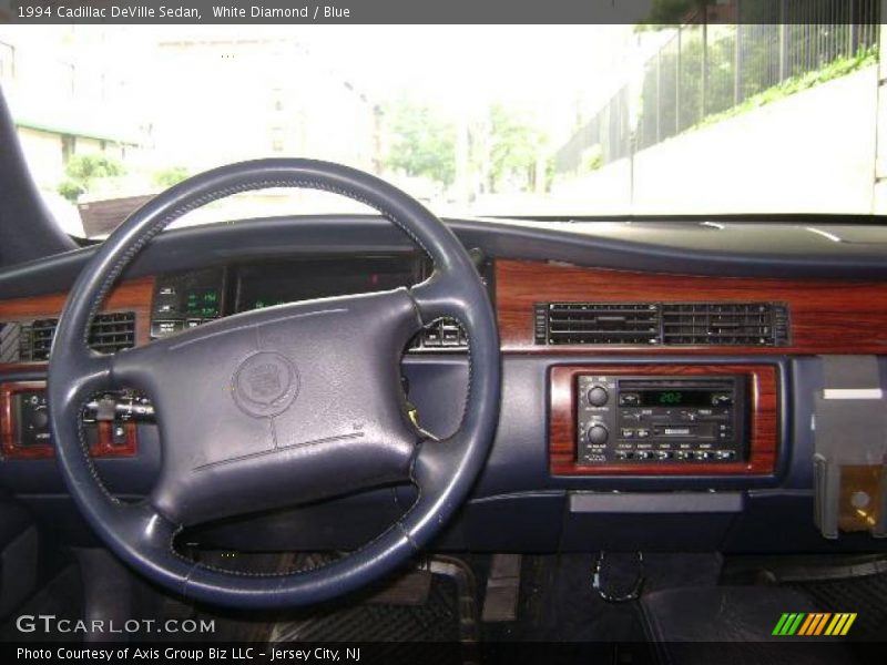 White Diamond / Blue 1994 Cadillac DeVille Sedan