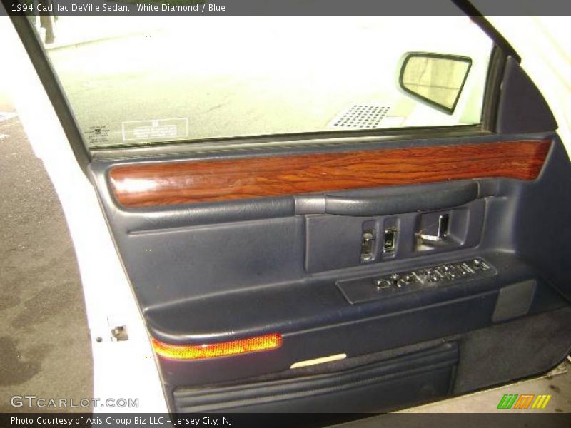 White Diamond / Blue 1994 Cadillac DeVille Sedan