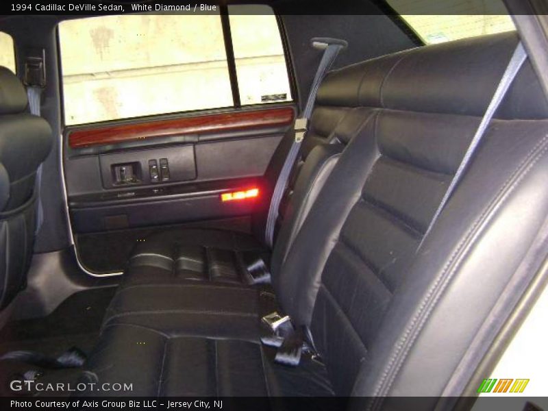 White Diamond / Blue 1994 Cadillac DeVille Sedan
