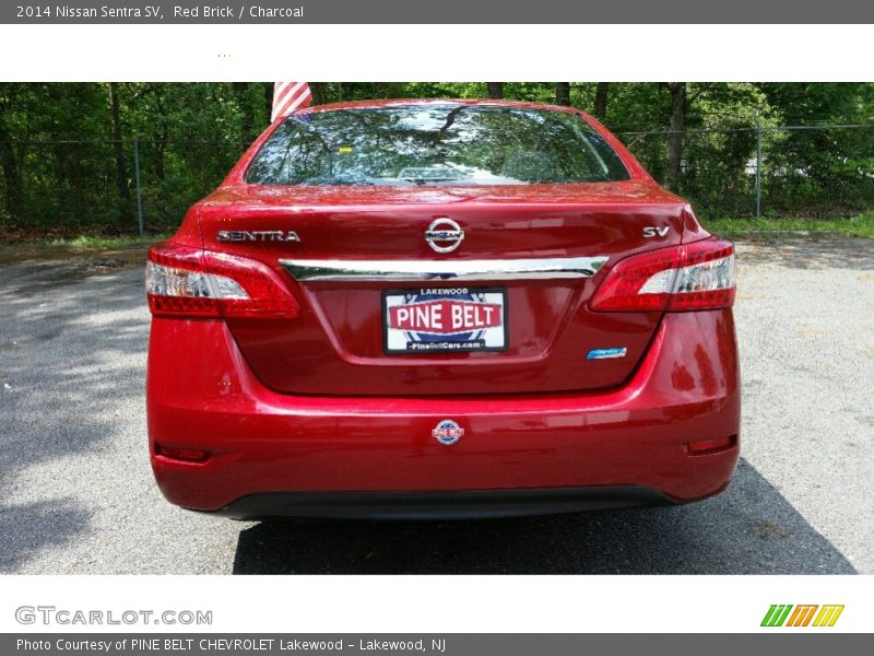 Red Brick / Charcoal 2014 Nissan Sentra SV