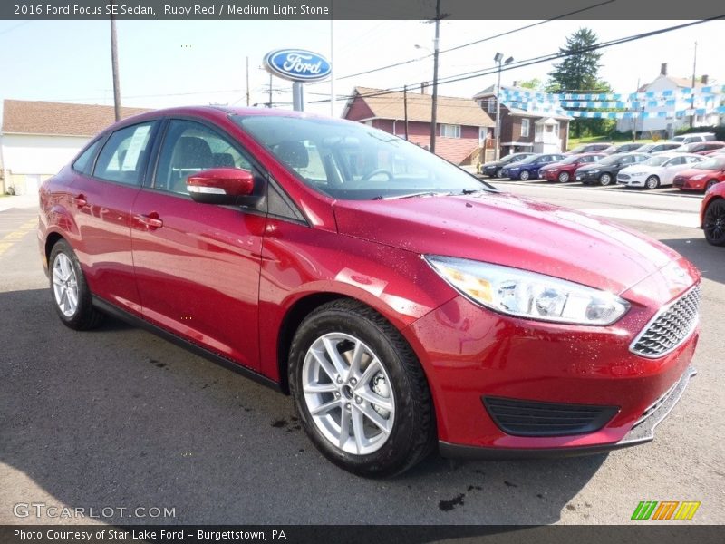 Ruby Red / Medium Light Stone 2016 Ford Focus SE Sedan