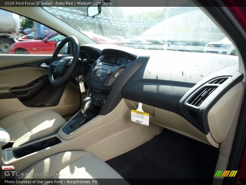 Ruby Red / Medium Light Stone 2016 Ford Focus SE Sedan