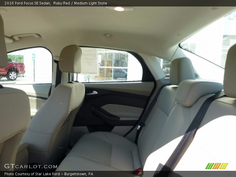 Ruby Red / Medium Light Stone 2016 Ford Focus SE Sedan