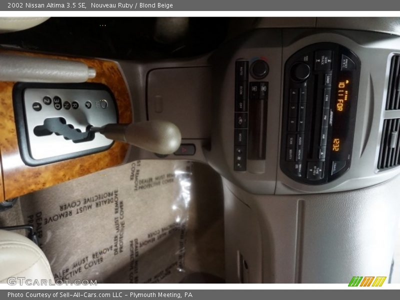 Nouveau Ruby / Blond Beige 2002 Nissan Altima 3.5 SE