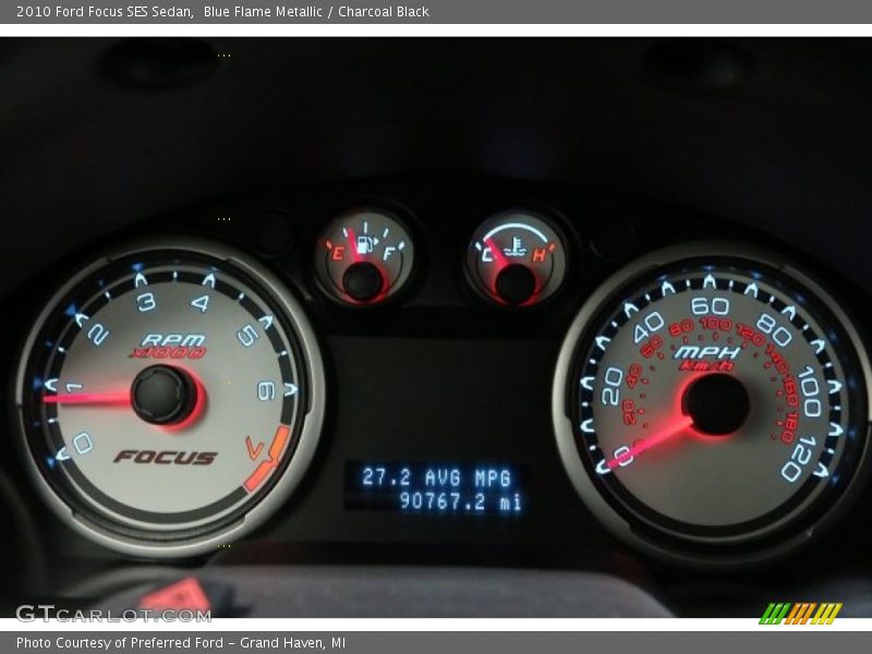 Blue Flame Metallic / Charcoal Black 2010 Ford Focus SES Sedan