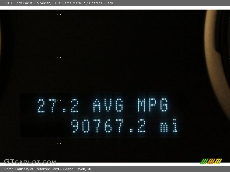 Blue Flame Metallic / Charcoal Black 2010 Ford Focus SES Sedan
