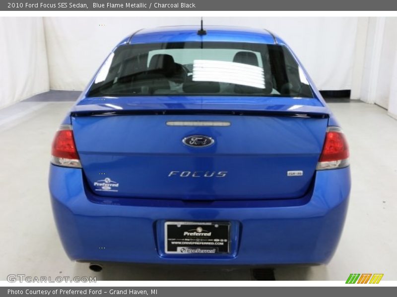 Blue Flame Metallic / Charcoal Black 2010 Ford Focus SES Sedan