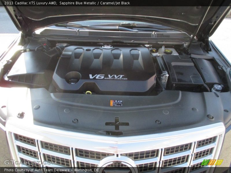 Sapphire Blue Metallic / Caramel/Jet Black 2013 Cadillac XTS Luxury AWD