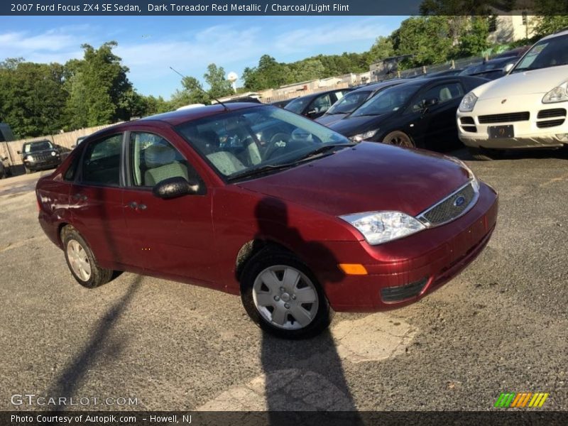 Dark Toreador Red Metallic / Charcoal/Light Flint 2007 Ford Focus ZX4 SE Sedan