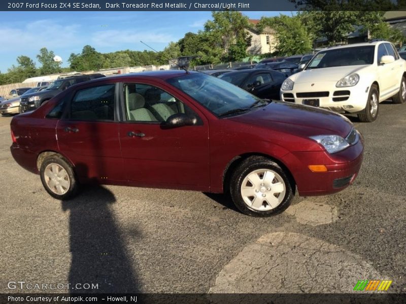 Dark Toreador Red Metallic / Charcoal/Light Flint 2007 Ford Focus ZX4 SE Sedan