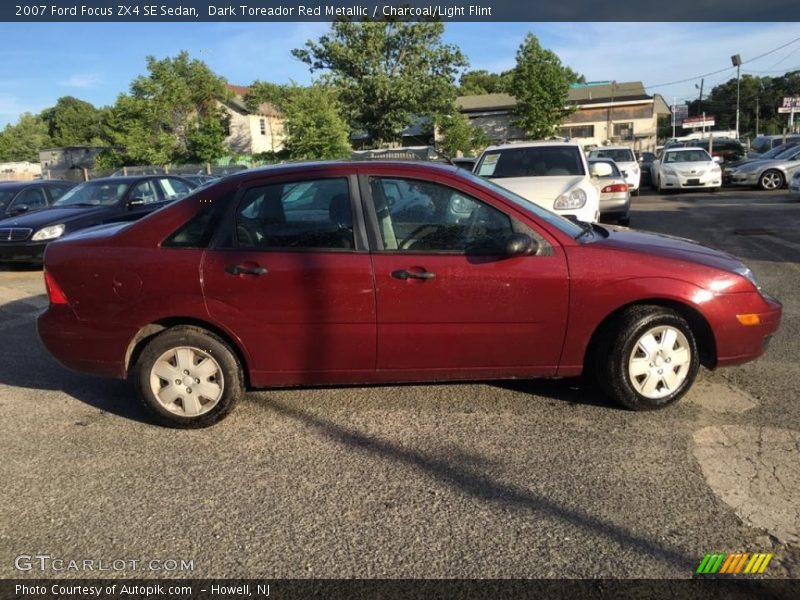 Dark Toreador Red Metallic / Charcoal/Light Flint 2007 Ford Focus ZX4 SE Sedan