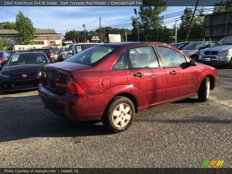 Dark Toreador Red Metallic / Charcoal/Light Flint 2007 Ford Focus ZX4 SE Sedan