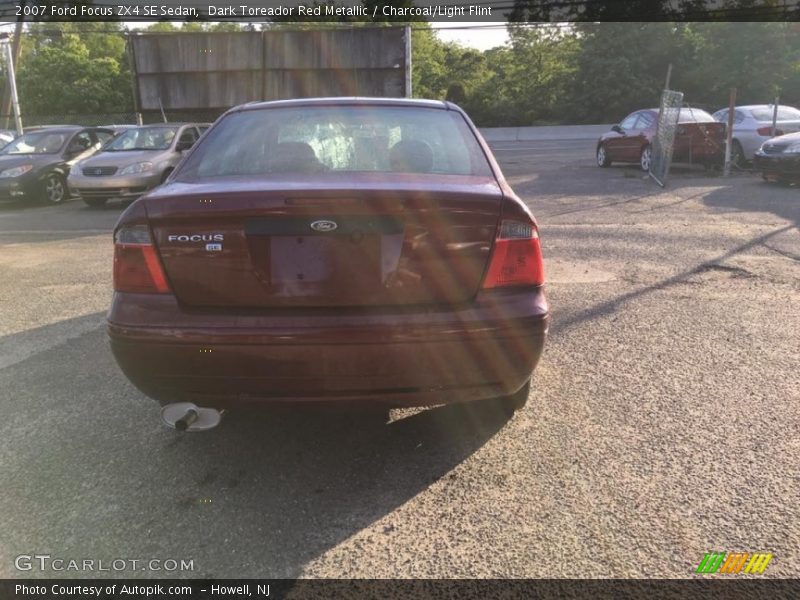 Dark Toreador Red Metallic / Charcoal/Light Flint 2007 Ford Focus ZX4 SE Sedan