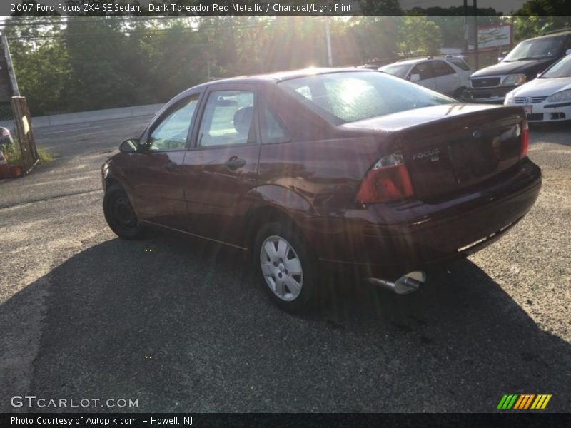 Dark Toreador Red Metallic / Charcoal/Light Flint 2007 Ford Focus ZX4 SE Sedan