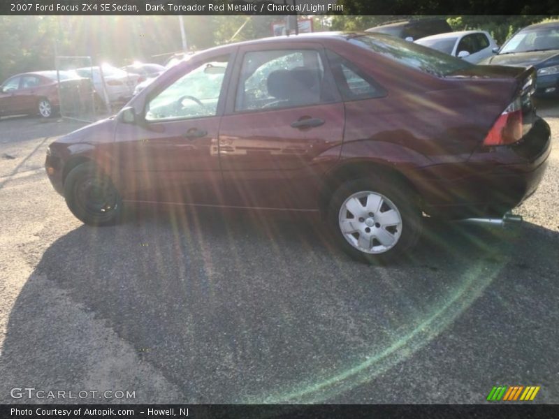 Dark Toreador Red Metallic / Charcoal/Light Flint 2007 Ford Focus ZX4 SE Sedan