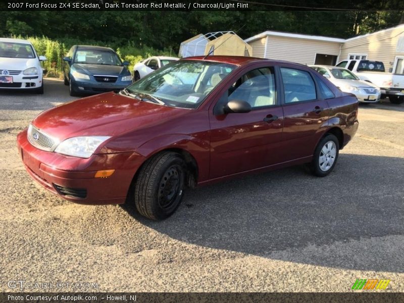 Dark Toreador Red Metallic / Charcoal/Light Flint 2007 Ford Focus ZX4 SE Sedan